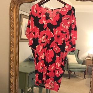 Black and floral mini dress. Trina Turk